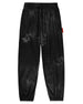 Black Triodrome joggers, front view