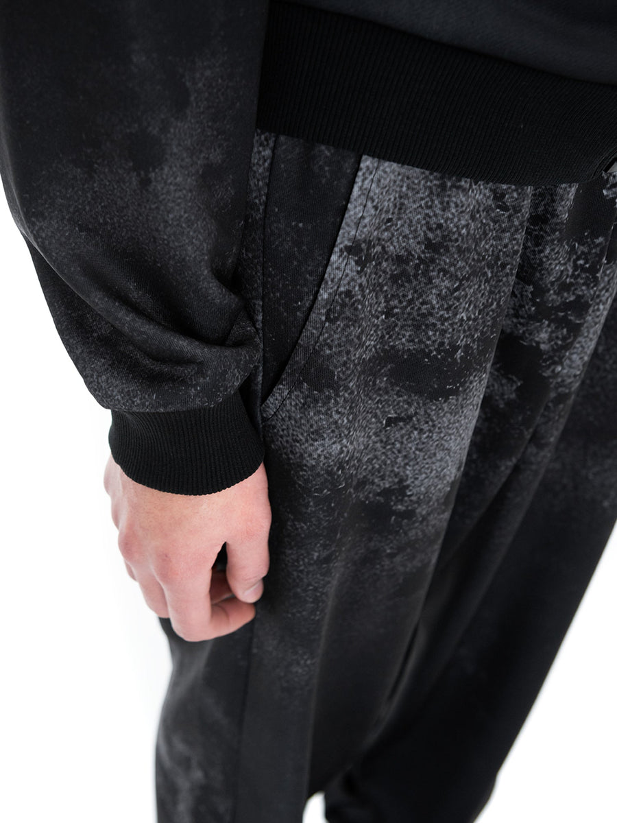 Black Triodrome joggers, side pocket detail