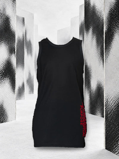 The black Concept tank top with the red lettering on the side, between white paper walls stained with black.