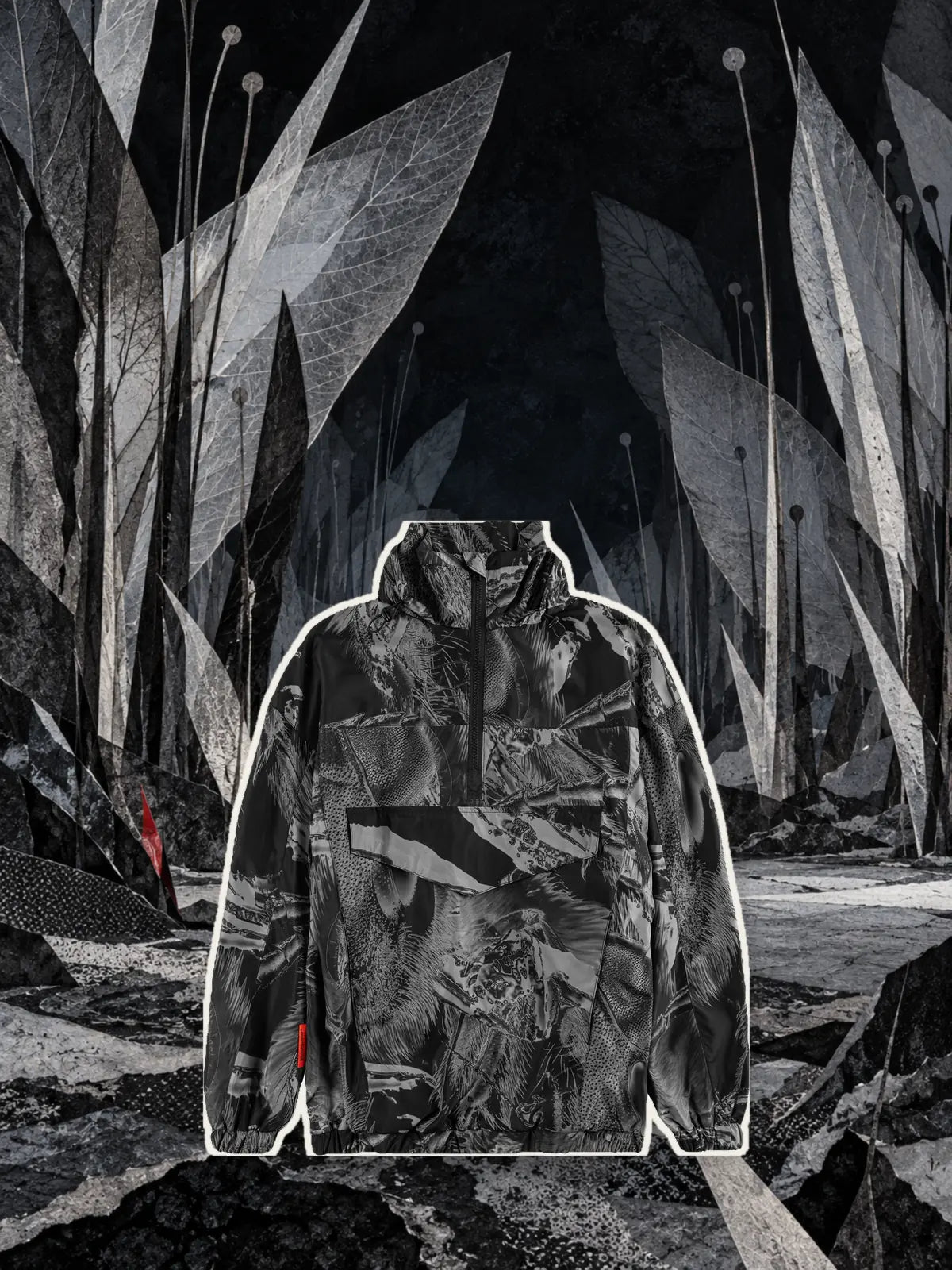 L'anorak nero Insectide Vision, ritagliato con un bordo di carta chiara, in una foresta notturna di ali e antenne di carta argentata.